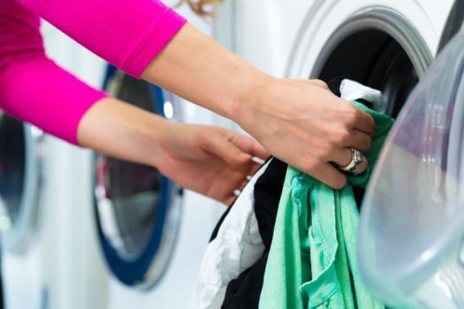 Female student doing laundry